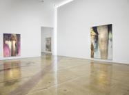Installation view of Nir Hod: The Life We Left Behind at Kohn Gallery, Los Angeles. A large white room with large iridescent canvases 
