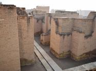 The crumbling walls of Babylon. 