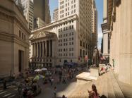 Intersection of Broad Street and Wall Street with New York Stock Exchange and the Federal Hall. Wikipedia.