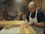 craftsman works on masterpiece frame