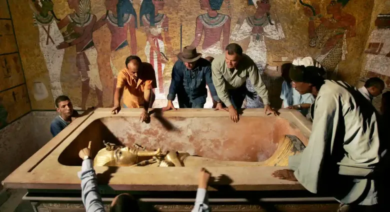 Zawi Hawass, the Egyptian head of the high council for antiquities, supervises the removal of the mummy of Tutankhamun in Luxor in 2007. 