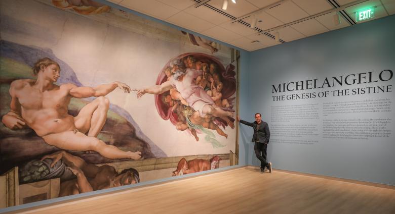 Michelangelo: The Genesis of the Sistine installation image; Adriano and The Creation of Adam
