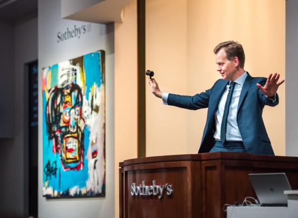 A live auction at Sotheby’s. Wikipedia.